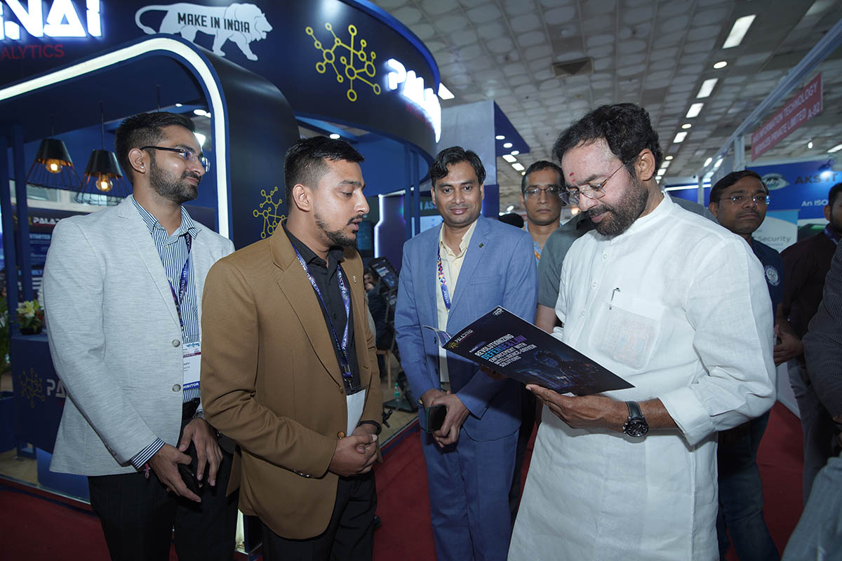 Industry representatives presenting security technology to a government delegate